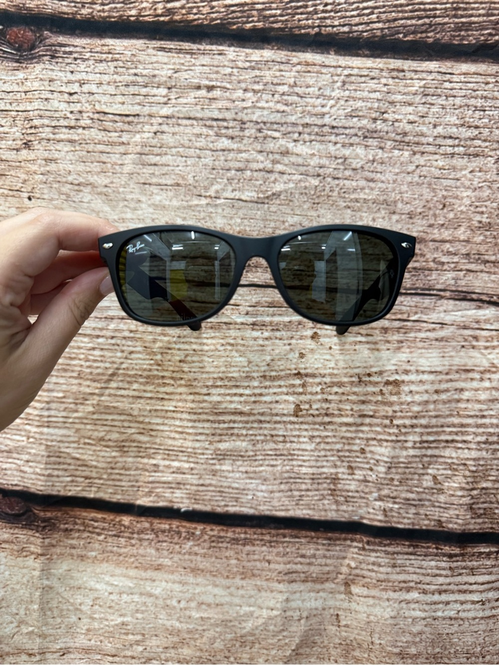 Ray-Ban Black Frame Sunglasses with Dark Lenses